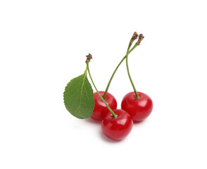 Fresh ripe cherries with green leaf isolated on white