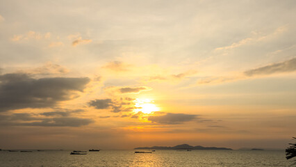 Dramatic sunset or sunrise and colorful sky over  the sea tree. Vacation, holidays concept.