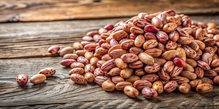 Raw pinto beans (Phaseolus coccineus) on a rustic wooden table in a Lanzarote farm, beans, pinto bean