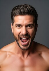 Shirtless Middle-Aged Man Screaming with Intensity &ndash; Angry Facial Expression on Neutral Background
