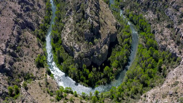 Aerial view of the Hoces del Cabriel Natural Reserve. The waters of Cabriel river, main affluent of the bigger J&uacute;car river, meander serving as natural border between Cuenca, Valencia and Albacete.