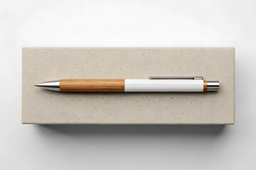 Elegant Wooden And Metal Ballpoint Pen With Minimalist White Barrel Design Placed On Beige Gift Box For Professional Writing