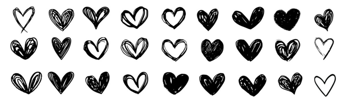 Doodle hearts drawn by hand. Grunge scrawls, chalk scribbles, rough brush strokes, underlines and circles. Bold charcoal freehand hearts. Crayon or marker scribbles