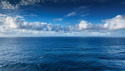 Fototapeta premium vast expanse of the atlantic ocean deep blue waters stretching to the horizon under a dramatic sky perfect for travel nature and ocean themed projects ocean oceanscape