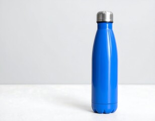 Blue insulated water bottle on a white surface