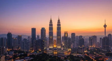 Foto auf Acrylglas Kuala Lumpur Majestic Kuala Lumpur Skyline at Sunrise: A Panoramic View of Petronas Towers and Cityscape  © popuo design