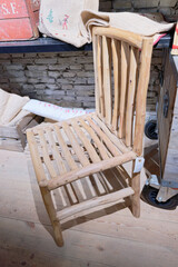 Vintage wooden stick chair in dark storage space