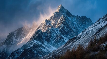 Obraz premium Majestic snow-capped peak at sunrise, clouds swirl