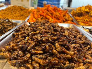 fried strawworm in the market