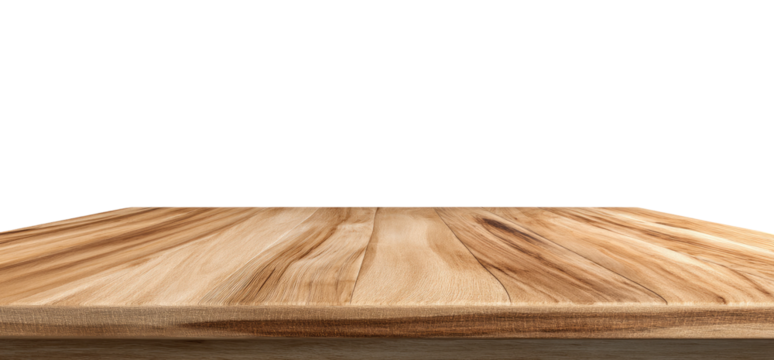 Close-up view of a light brown wooden tabletop against a black background.  A smooth, natural wood grain pattern is prominent