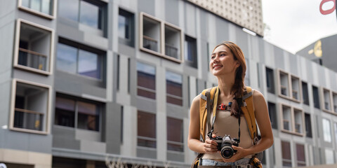 Naklejka premium Traveling Photographer Capturing Urban Moments