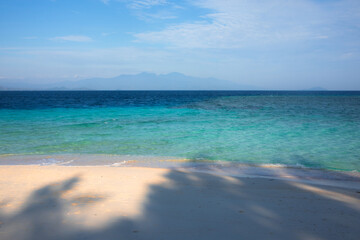 Tropical Beach with Turquoise Ocean Waves.