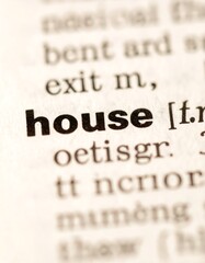 Close-up of a dictionary page with the word "house