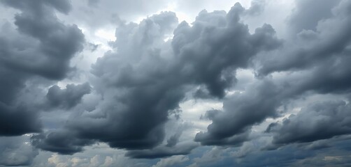 Obraz premium Dark, brooding sky filled with dramatic clouds, ample copyspace, meteorology, intense