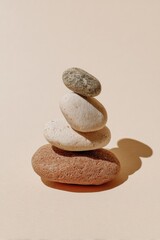 Stacked stones, soft light, minimalist