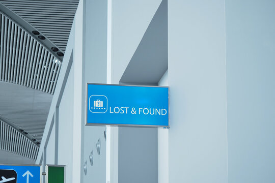 Lost and found sign in modern airport terminal environment