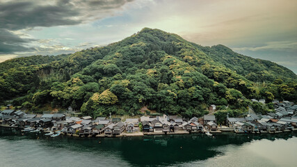 Fototapeta premium Aerial view of Ine fishing village and boathouses in Kyoto, Japan
