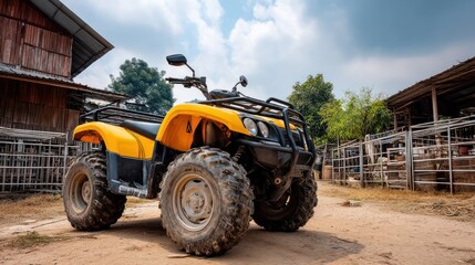 Obraz premium A yellow ATV parked in front of a wooden barn with a blue sky in the background.