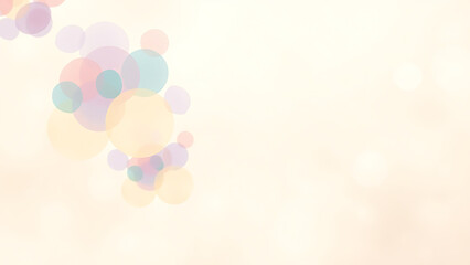 Soft focus pastel colored bokeh lights creating a dreamy and ethereal background with a gentle gradient of warm and cool tones for a festive or celebratory mood