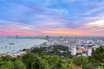 The building and skyscrapers in twilight time in Pattaya,Thailand. Pattaya city is famous about sea sport and night life entertainment.
