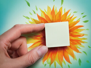 白いフレームを持った手