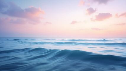 Serene ocean waves gently roll under a soft pastel sky painted with clouds at sunrise or sunset evoking a sense of peace and natural beauty