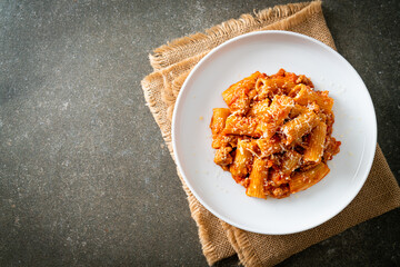 Rigatoni pasta bolognese with cheese