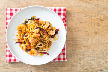 spicy spaghetti seafood on plate