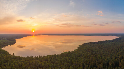 a large lake in a summer forest