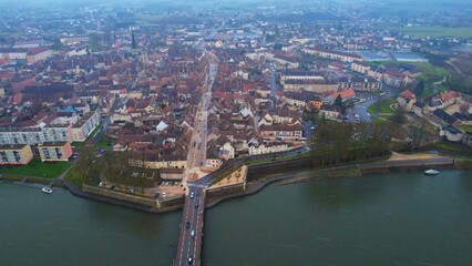 Aerial panorama view of the old town around the city of Auxonne in France on a cloudy winter...