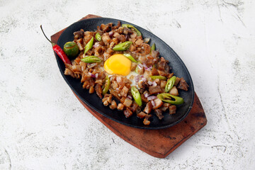 Freshly cooked Filipino food called Sisig