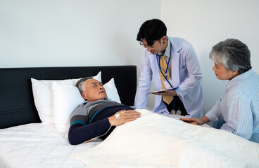 doctor explaining medical treatment for bedridden patient elderly hopeless senior man lying on bed. home caregiver nurse visit retirement patient for health check up recovery process medical service