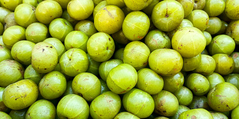 Fresh Indian Gooseberries or Amla at Local Market