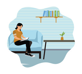Obraz premium A woman sits relaxed on the sofa and reads a book.