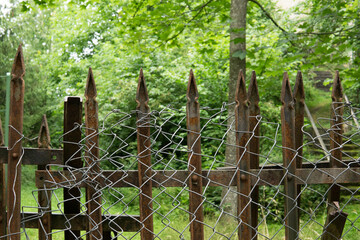 Obraz premium Abandoned Spike and Chain Fence