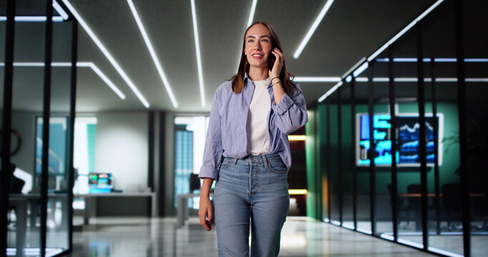 Busy Female Executive Balancing Work And Social Life