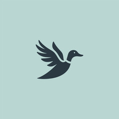 Flying duck logo in smooth and simple silhouette design.
