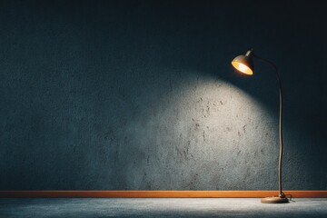 A solitary floor lamp illuminating a textured blue wall in a dimly lit room, creating a cozy atmosphere