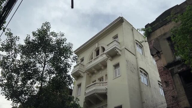 Old jamindar house in white color in Kolkata. 
