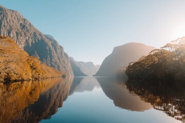 Serene mountain lake mirrored in calm water