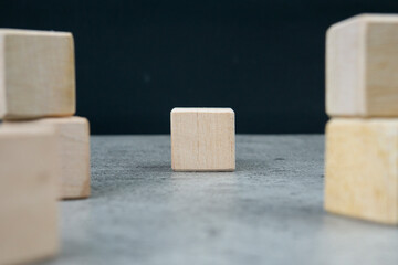 Blank wooden cubes on the table with copy space, empty wooden cubes for input wording, and an infographic icon