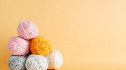 Colorful Yarn Balls on Yellow Background
