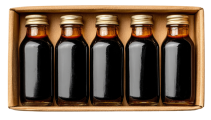 Five small, dark-colored bottles, tightly capped and arranged in a cardboard box.  Amber-brown liquid fills each