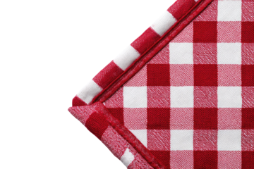 Close-up corner of a red and white checkered tablecloth