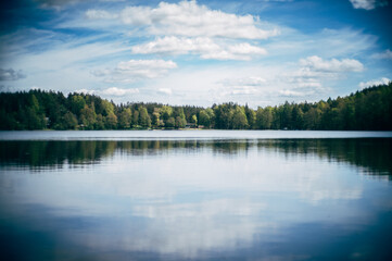 Flat surface of the lake in summer