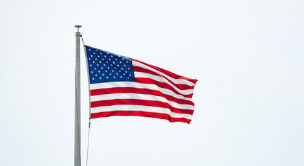 Fototapeta premium American flag waving in the sky
