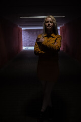 Portrait of a young beautiful girl in yellow clothes.