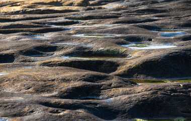 clear water in the rocks of the rocky ocean shore
