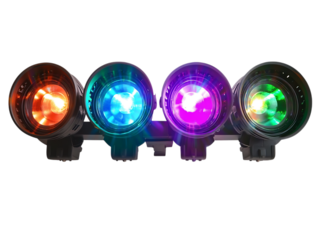 Four colorful stage lights emitting red blue purple and green light isolated on transparent background