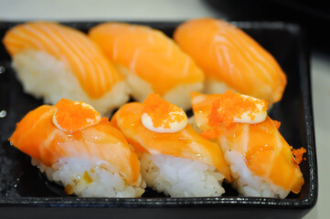 salmon sushi ,sushi or rice topped with salmon or salmon roll